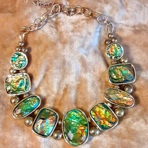 Vintage faux ammonite lucite necklace, gold tone metal.